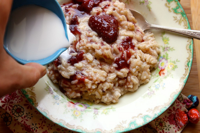 coconut milk rice pudding with strawberry jam