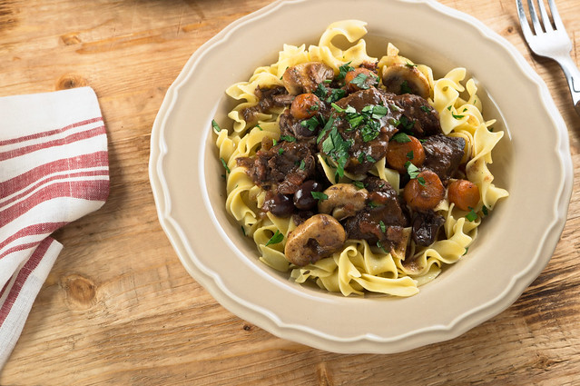provencal beef stew with buttered noodles