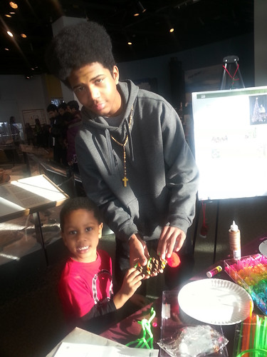 Youth attending the Science Museum of Minnesota’s Science Fusion Saturday event use their creativity to make ornaments for the 2014 Capitol Christmas tree. (U.S. Forest Service/Teri Heyer)