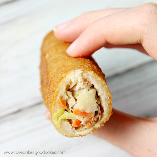 Tai Pei® Egg Roll in hand showing the inside.