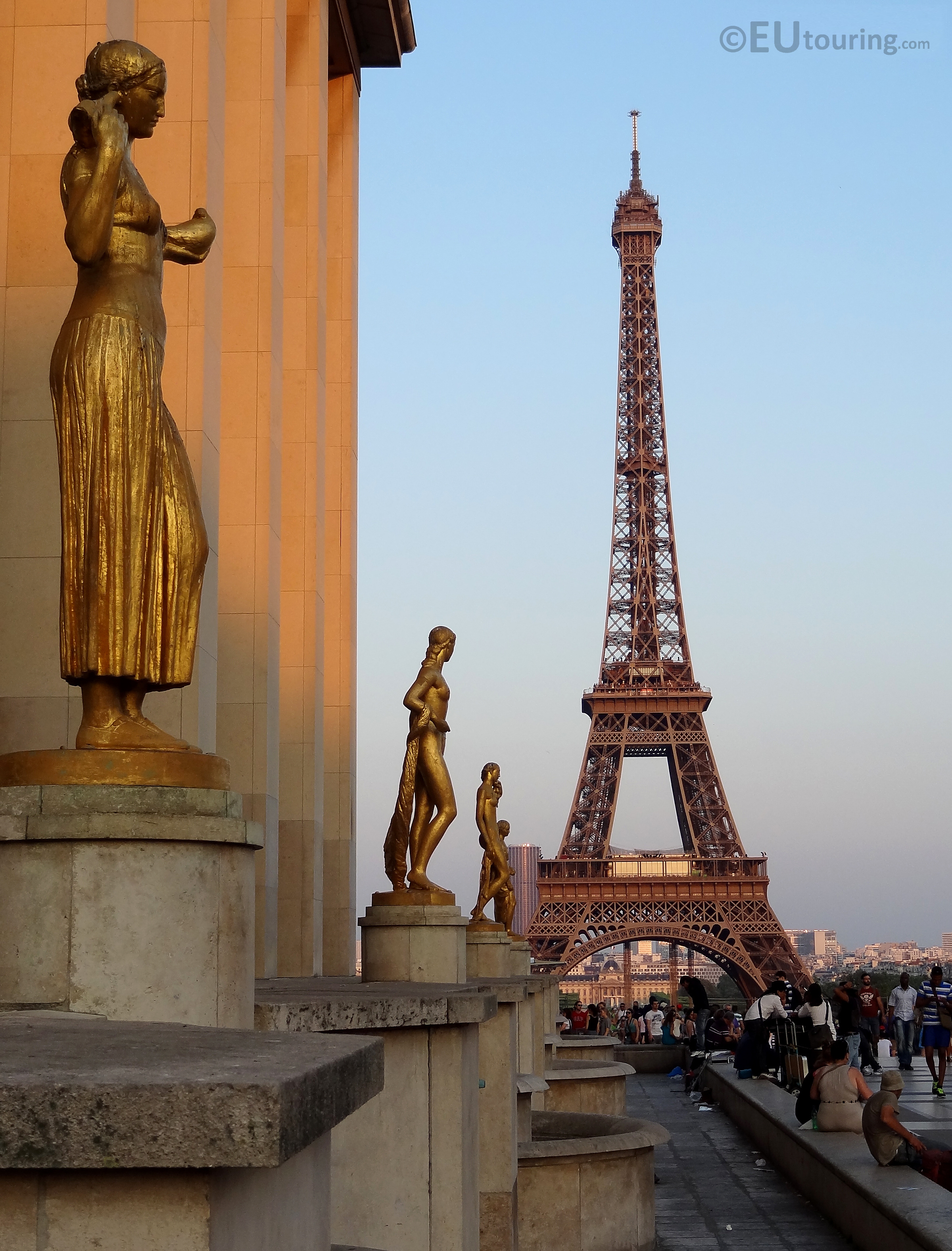Four golden statues at Palais de Chaillot