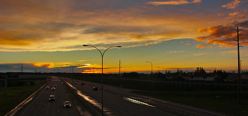 road street city sunset summer sky urban signs cars nature grass weather clouds canon reflections fire evening twilight highway glow traffic dusk streetlights horizon silhouettes atmosphere vehicles powerlines freeway chinook puddles automobiles fiery davidsmith deerfoottrail calgaryalbertacanada eos60d