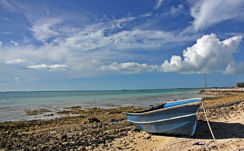 beach water clouds boat bahamas rocksound eleuthra