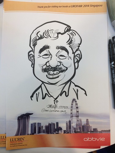 caricature live sketching for Urofair 2014 - Day 1