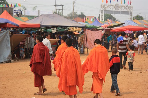 Monks hanging out at the fair
