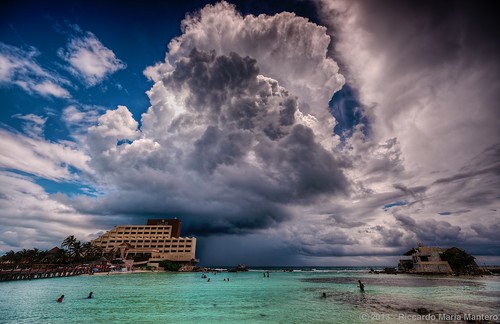 travel blue light sea summer vacation sky cloud holiday seascape storm water colors rain weather clouds contrast america umbrella landscape mexico outdoors island hotel mare awesome horizon hurricane fineart bad wideangle stunning incoming tropical caribbean tempest polarizer mujeres isla hdr highdynamicrange avalon dreamscape islamujeres cumulonimbus