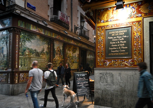 In Madrid, a Street with Cafes with Tiled Murals