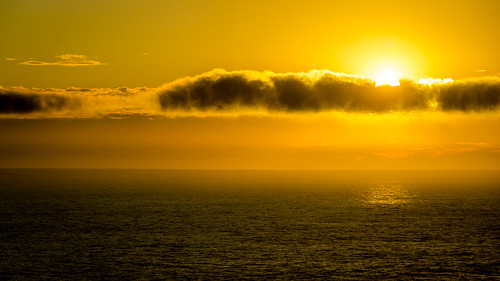 slopepoint southpacificocean cloud headland nature ocean outdoor sky sun sunset southisland newzealand