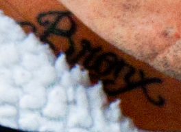 Man-with-Bronx-neck-tattoo-and-baby--Union-City-(detail)