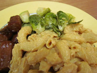 Cheezy Mac; Garlic-Roasted Brussels Sprouts; steak-sauce glazed sausages