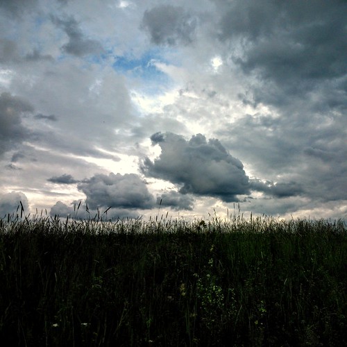 sky storm clouds meadow