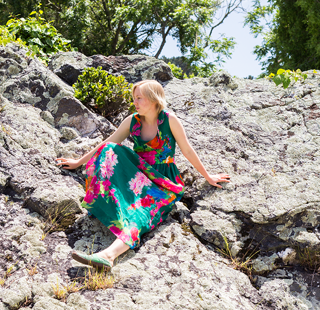 bright pink and green vintage maxi dress, rock covered with lichen