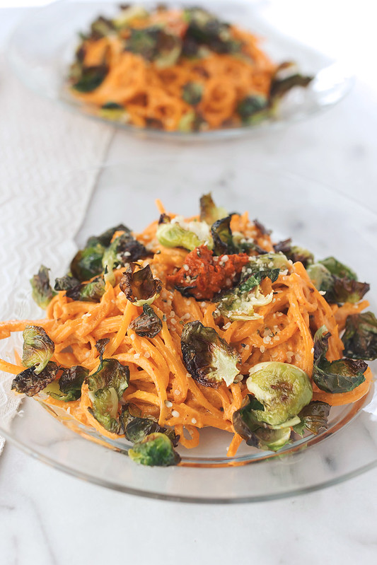 Butternut Squash Noodles with Harissa Cashew Cream and Crispy Brussels Sprout Chips // @tastyyummies // www.tasty-yummies.com