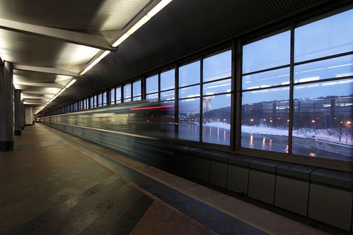 A train speeds out of the platform