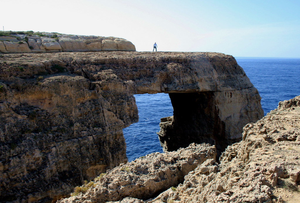 Mario on top of 'Window' at Wied il-Mielah, Gozo