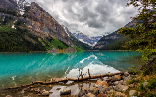 morning travel trees summer cloud mountain lake snow canada mountains reflection tree water rock clouds forest canon landscape nationalpark rocks cloudy outdoor overcast alberta banff rockymountains dslr lakelouise 1740 banffnationalpark 6d 1740l canadianrockies fairviewmountain canon6d