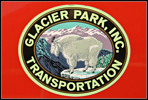 travel sign montana transportation glaciernationalpark redbustour glacierparkinc redjammerbus