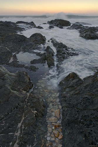 ocean sunset water rock sunrise landscape shoreline pebbles falsebay kogelbay afszoomnikkor1424mmf28ged