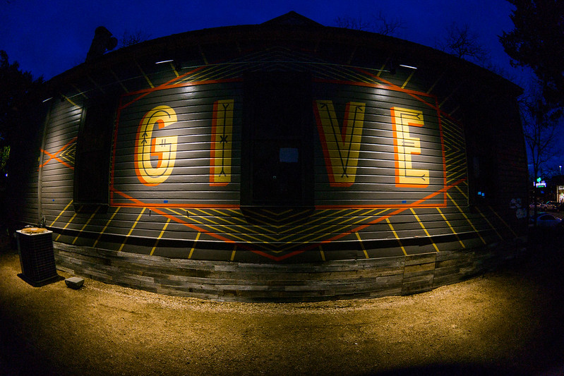 Give Sign on TOMS South Congress Austin