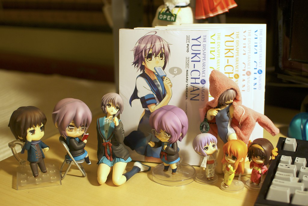 Photo of the latest volume of everyone's favourite manga, along with all my Yuki figures