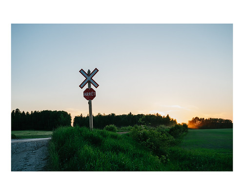 ca canada rural landscape crossing quebec dusk rail fields railwaycrossing topographies saintgédéon vscofilm