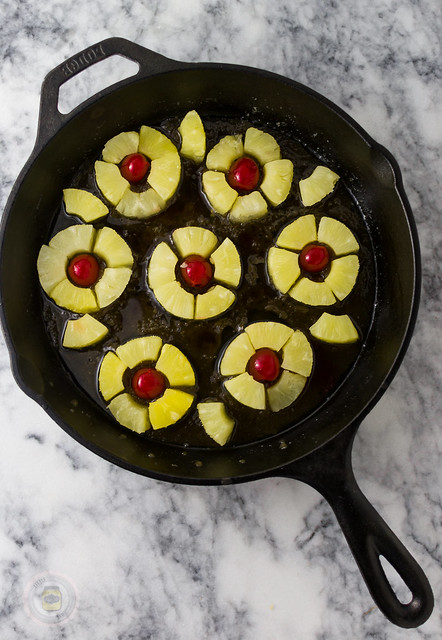 pineapple and cherry design created in cast iron before pouring batter on top
