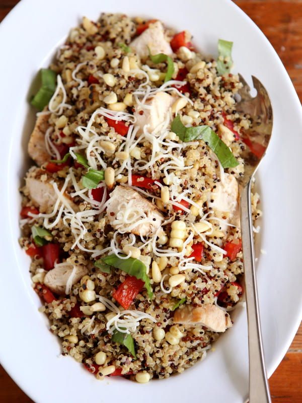 Chicken Quinoa Bowls with Grilled Corn, Red Peppers and Pine Nuts from completelydelicious.com