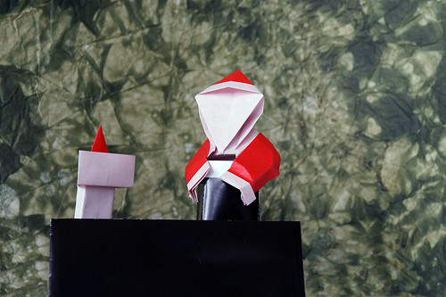 Origami Santa is in the chimney (Yannick Gardin) - Origami Santa got stuck up the chimney (Wayne Brown)