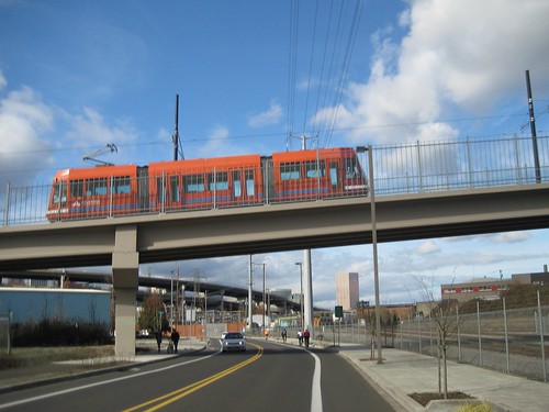 Orange/Red climbs the bridge towards MLK