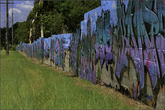 The graffiti wall at Northern Auto Wreckers