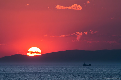 sunset sea sun mountain clouds ship gulf cargo greece evia euboea eviaisland