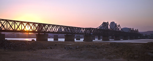 china city bridge sunset water skyline river riverside dusk steel piers horizon border korea shore girder northkorea 중국 dprk yalu dandong 조선 북한 신위주