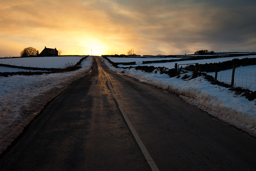 road sunset snow