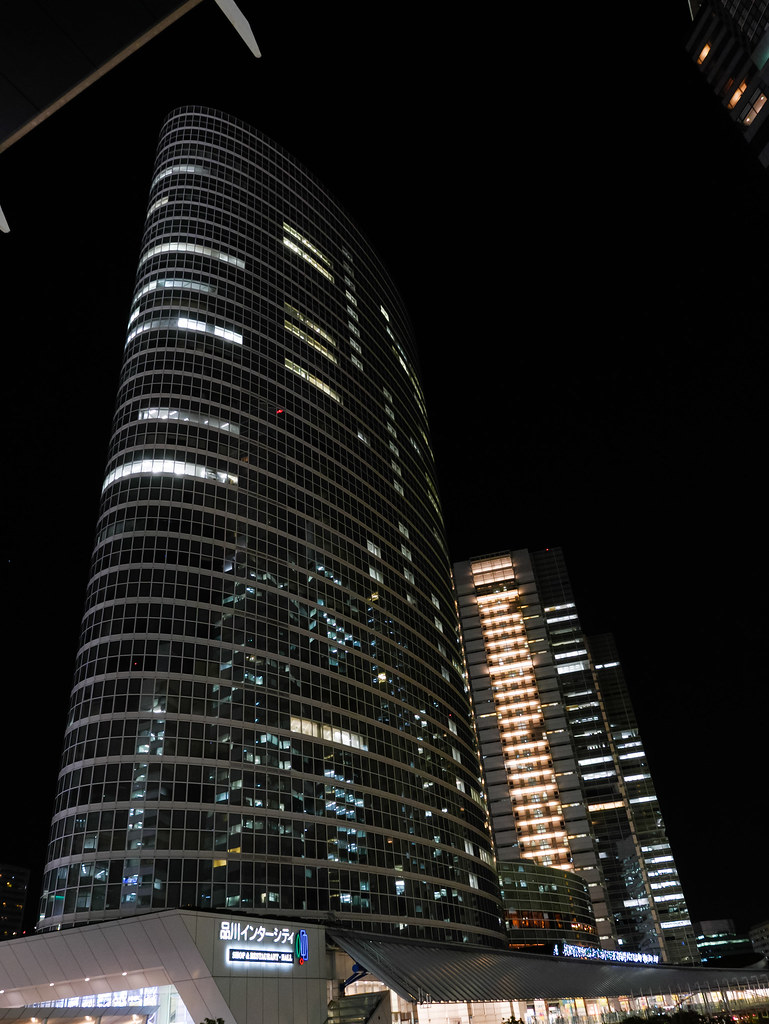 Shinagawa Intercity reflecting Shinagawa buildings.