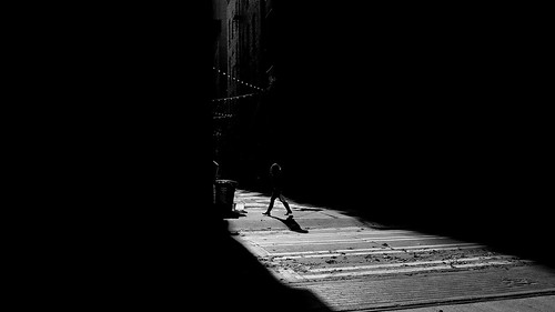 seattle blackandwhite woman contrast washington alley shadows streetphotography sidewalk ricohgr johnwestrock