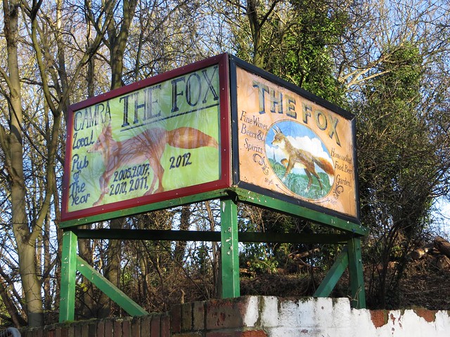 The Fox pub sign on the canal