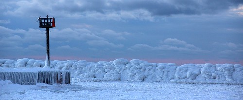 winter sunset ice weather leland harbor frozen michigan lakemichigan greatlakes breakwall leelanau leelanaucounty icecovered