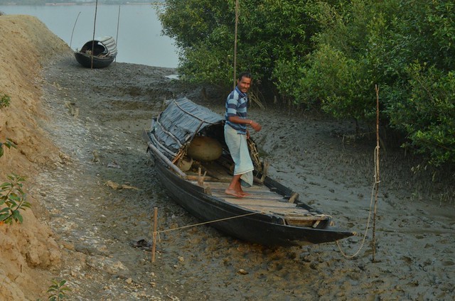 A fisherman on his boat.JPG