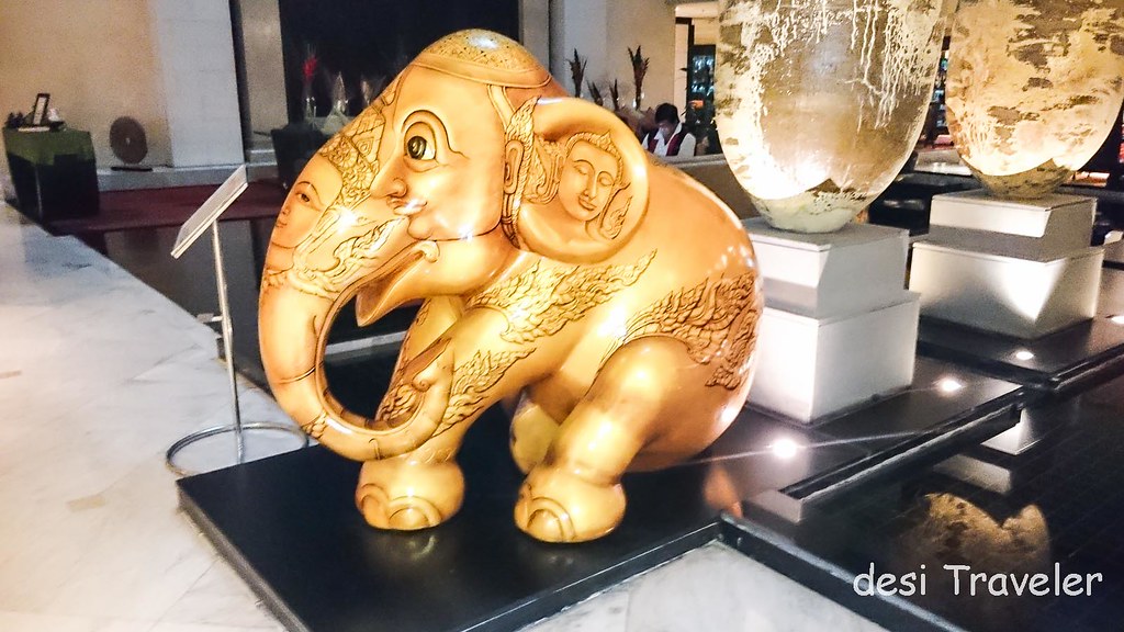 Buddha painted on golden elephant parade