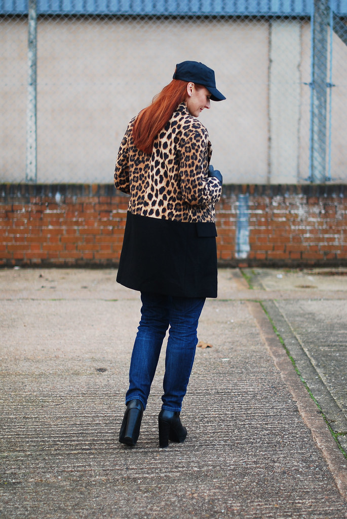 Leopard print coat with baseball cap and jeans