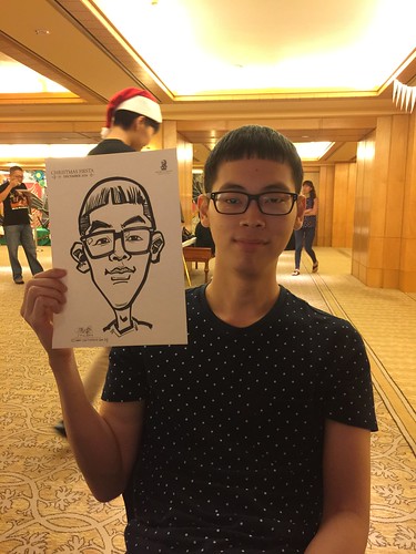 Caricature live sketching for Ritz Carlton Christmas Fiesta 2014