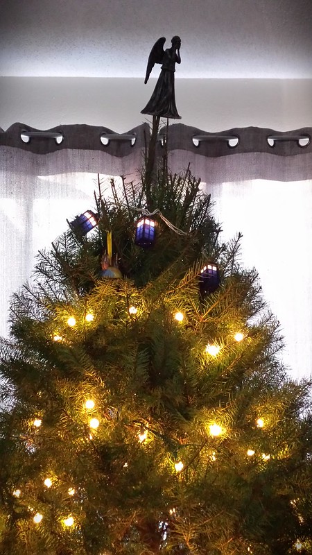 Our Christmas tree :) (still needs ornaments, but pretty fun as is)