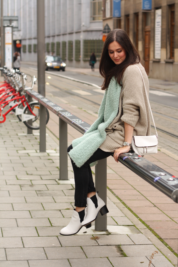 outfit layers white boots oversized cardigan scarf