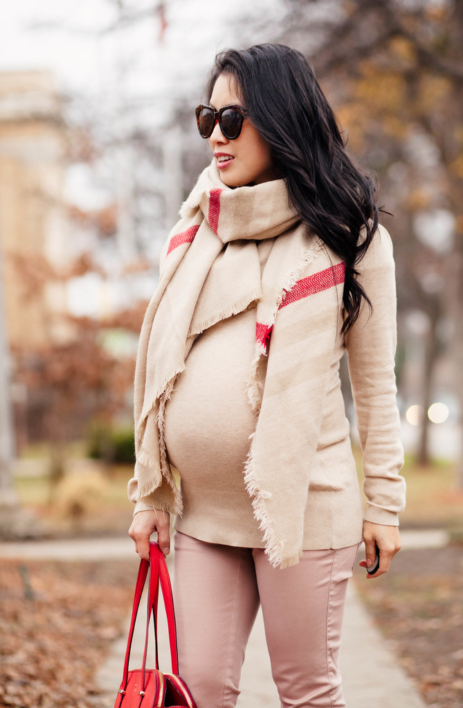 cute & little blog | petite fashion #maternity #bumpstyle #thirdtrimester | chicwish indians stripe scarf, beige turtleneck tunic, pink skinny pants, kate spade rose gold pumps, kate spade red bag | fall winter outfit