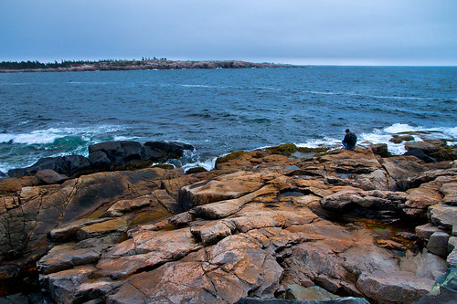 ocean blue portrait man beach water coast nationalpark waves photographer cloudy maine rocky atlantic granite kneeling peninsula acadia schoodic