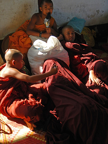 Little Monks Playing with Gun in the Temple