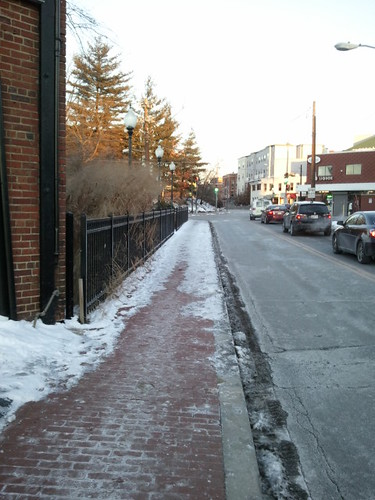 Snow removal ends as the city pocket park sidewalk begins