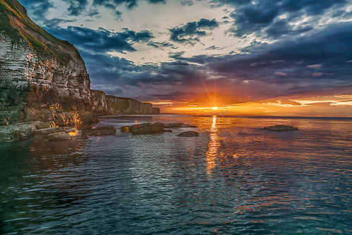 sunset seascape rocks thornwickbay