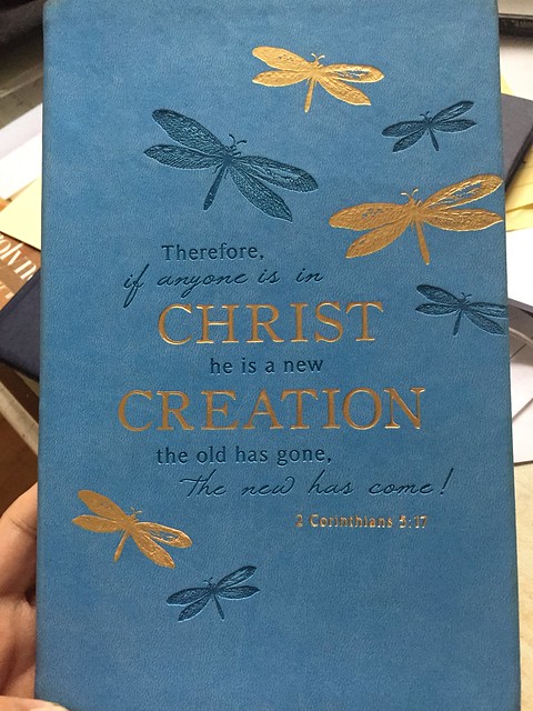 Blue notebook with Christ cover