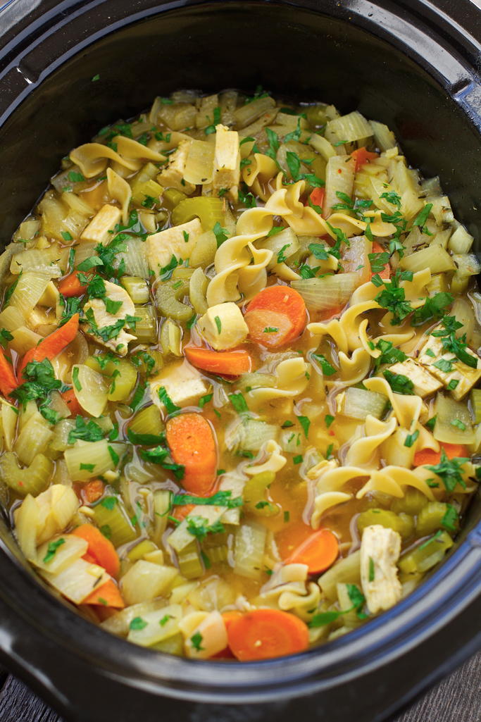 Chicken Noodle Soup {Slow Cooker} Toss everything into the slow cooker and sit back. This warm, comforting soup cooks itself! #chickennoodle #chickennoodlesoup #soup #slowcooker #crockpot | Littlespicejar.com